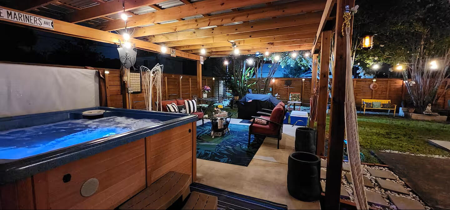 Hot Tub & BBQ Lounge • Covered Outdoor Hangout Space