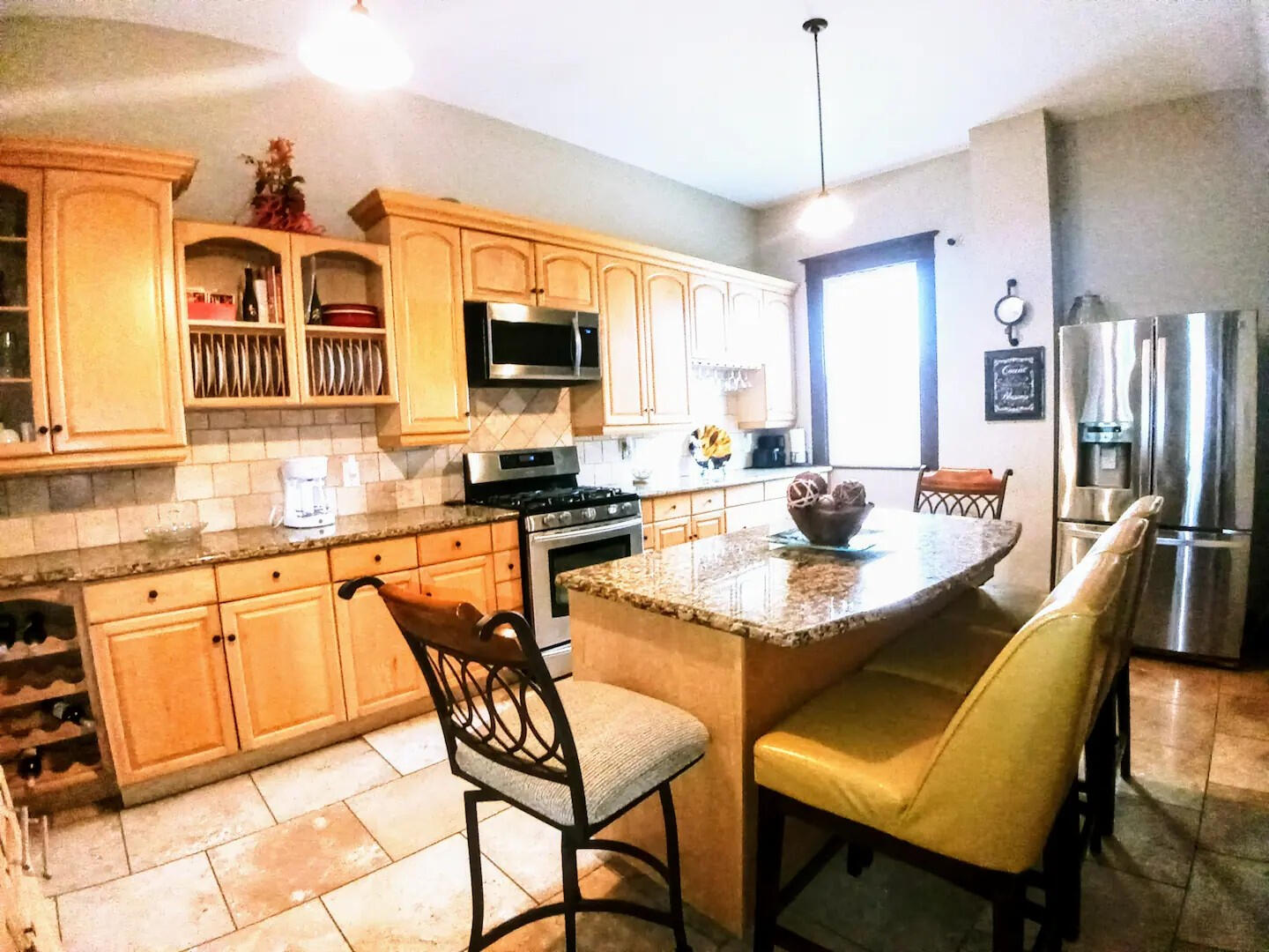 Fully Equipped Kitchen • Island Seating & Modern Appliances